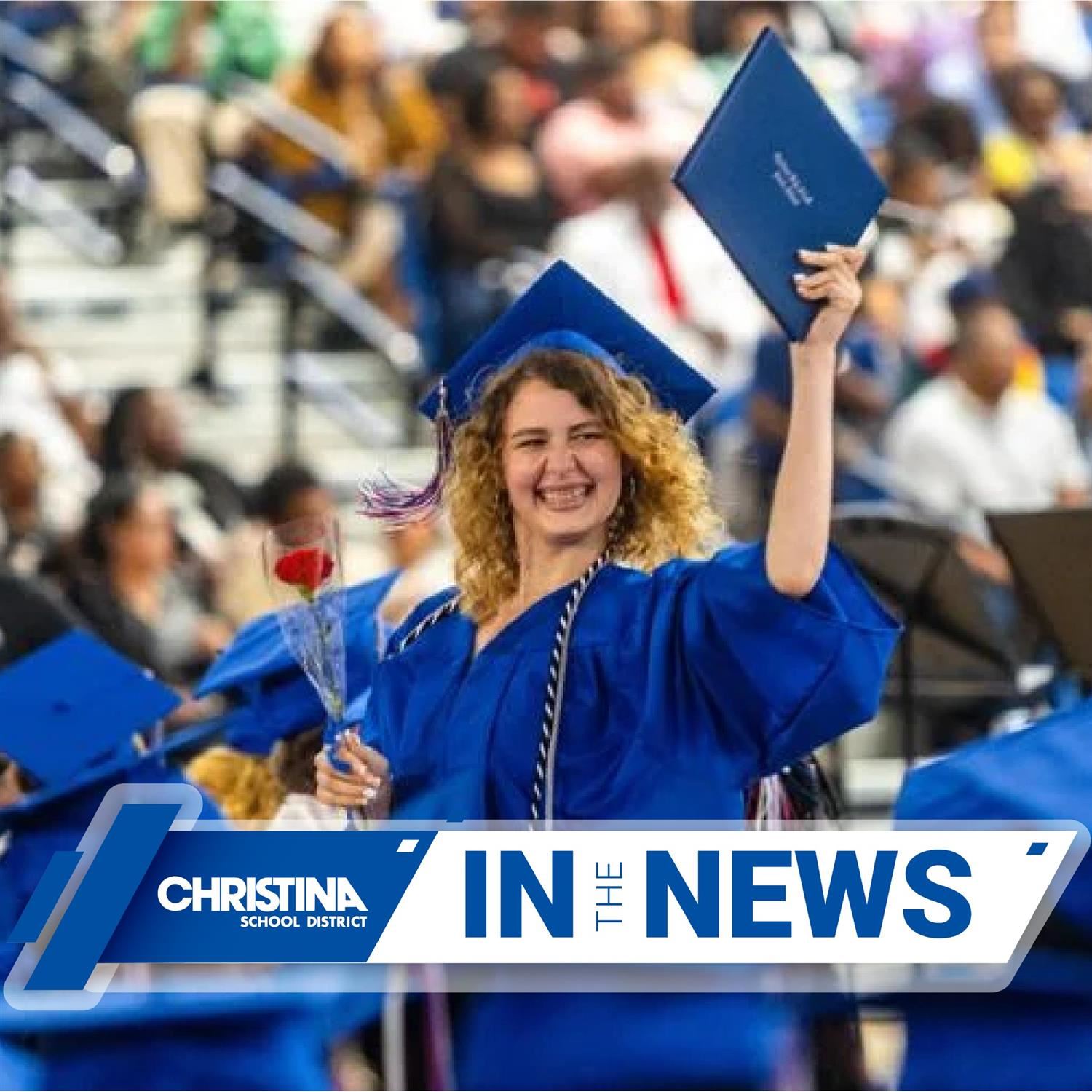  Christina School District In The News photo of Christiana HS graduate happy holding diploma